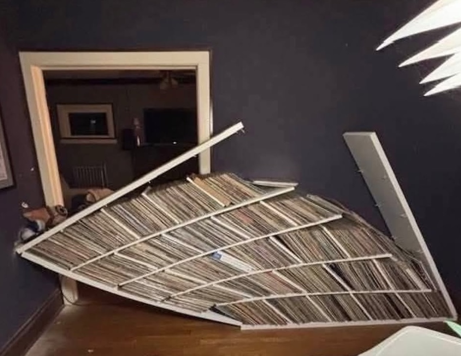 Broken and leaning media shelf